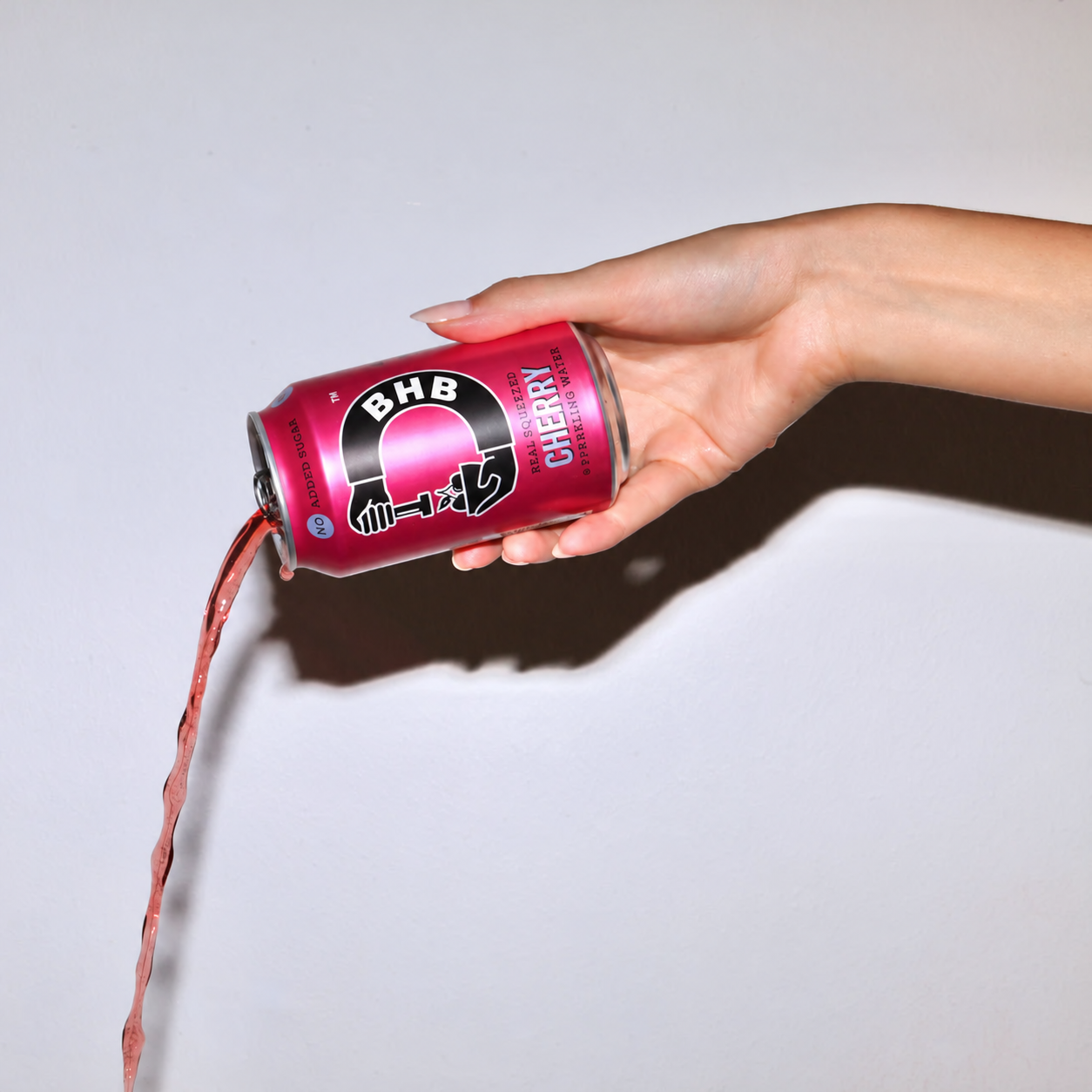 Cherry soda served with a slice of citrus