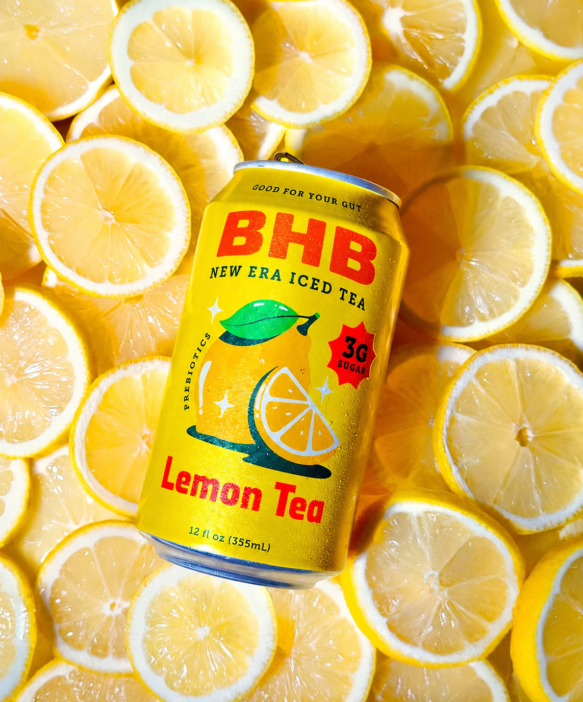 Lemon tea can surrounded by fresh lemons